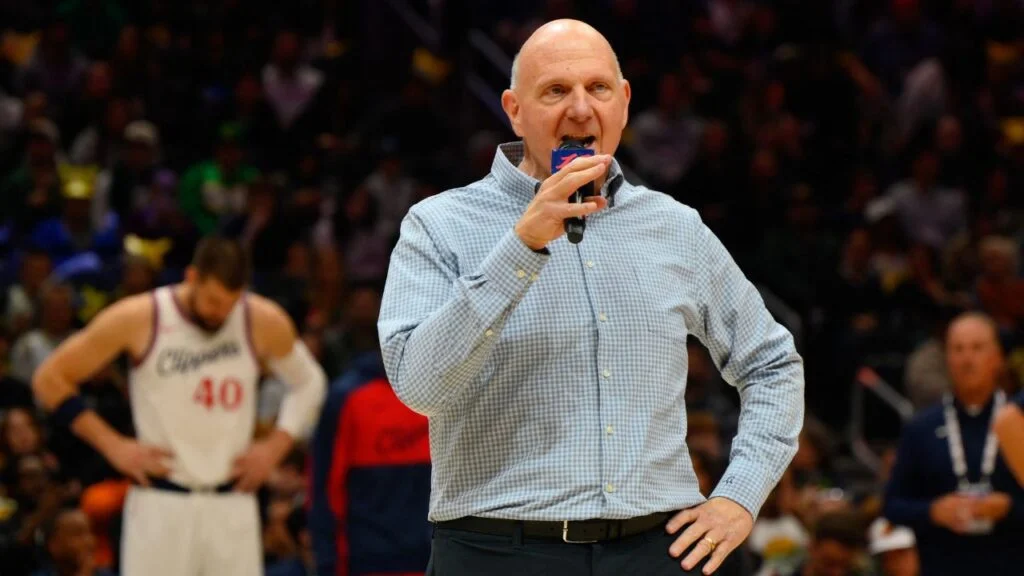 Oct 11, 2024; Seattle, Washington, USA; Los Angeles Clippers owner Steve Ballmer speaks to the crowd before the game between the Los Angeles Clippers and the Portland Trail Blazers at Climate Pledge Arena. Mandatory Credit: Steven Bisig-Imagn Images